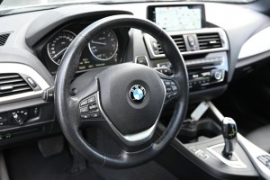 BMW 1-serie 118i Automaat High Executive Adaptieve Cruisecontrol Schuifdak